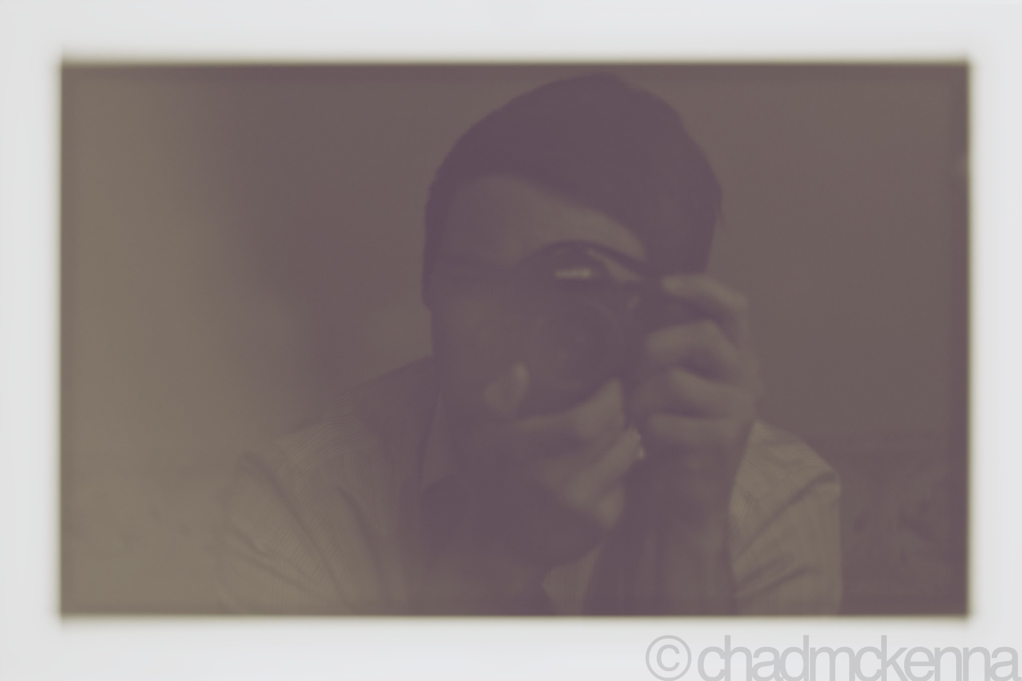 Hipster self-portrait. (Nikkor 50mm, 1/10, F/1.8, ISO 200 on D5000)