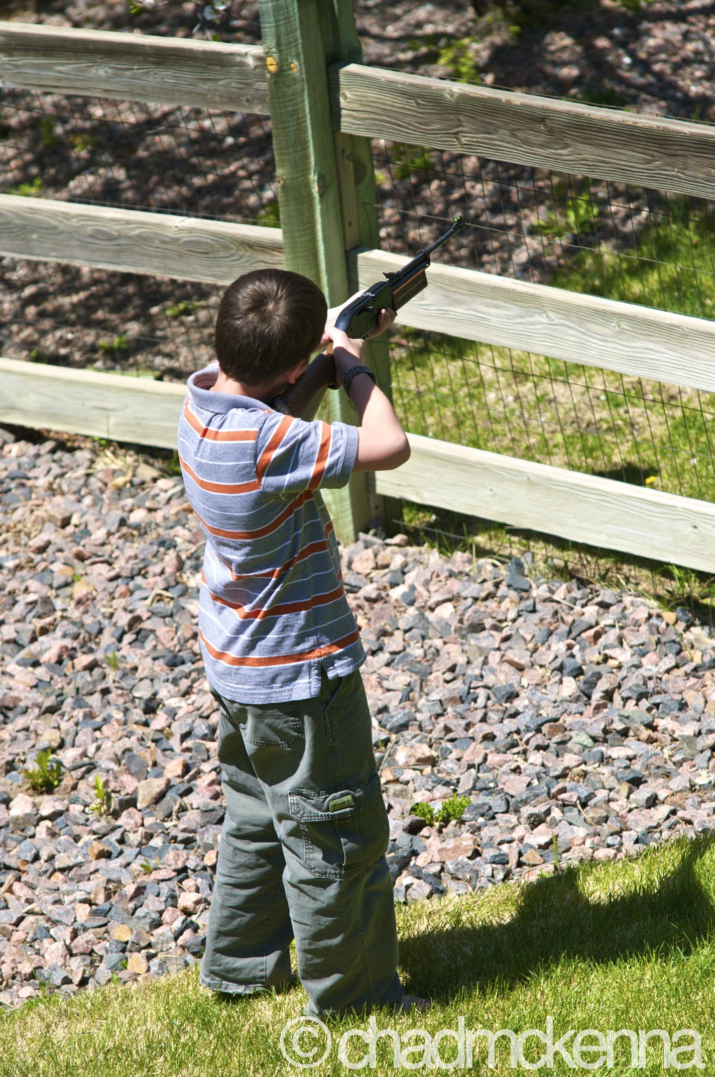 My Little Brother Shooting Rabbits. (Sigma 70-200mm, 145mm, 1/4000, F/4, ISO 800 on D5000)