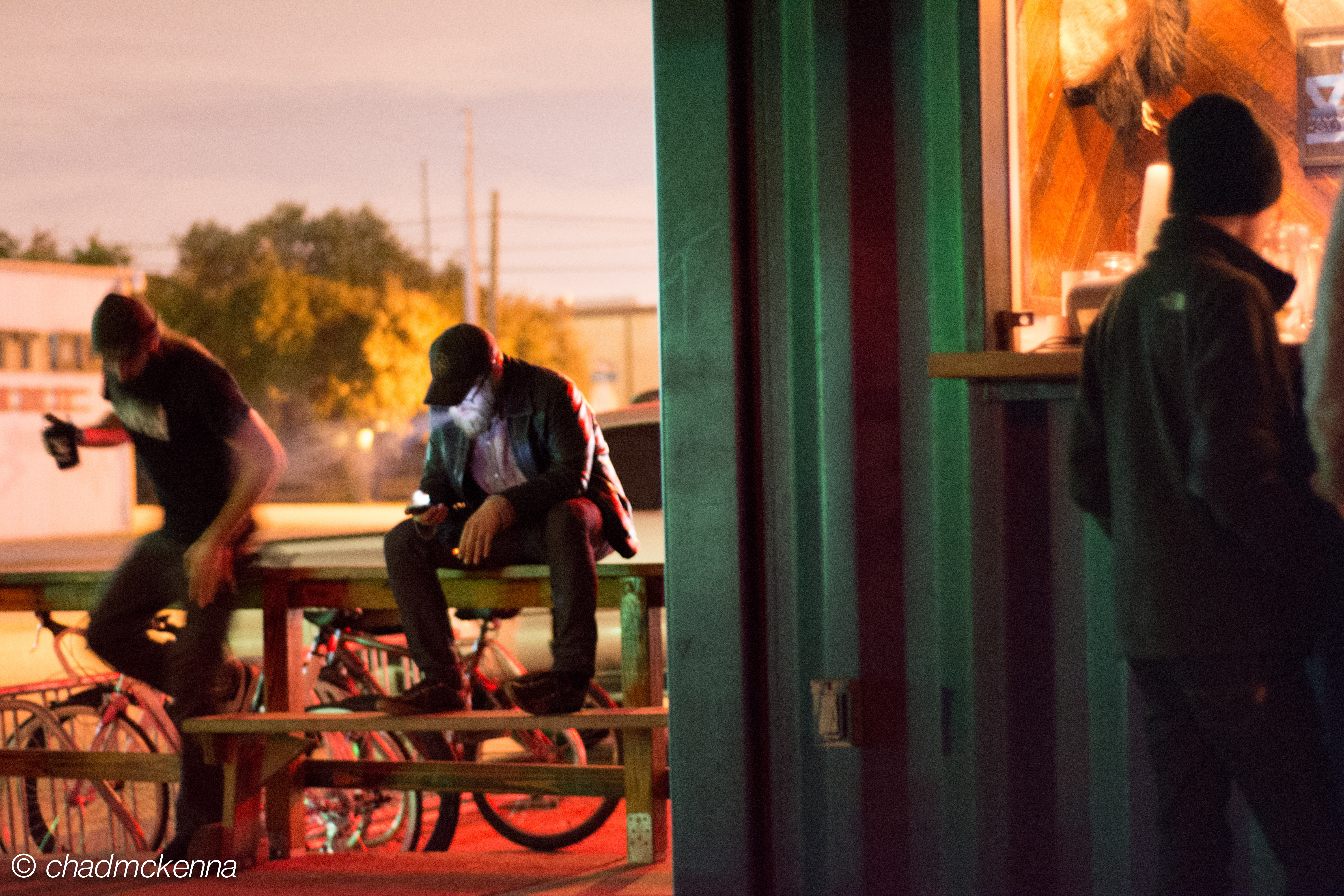 hipster at moon tower in